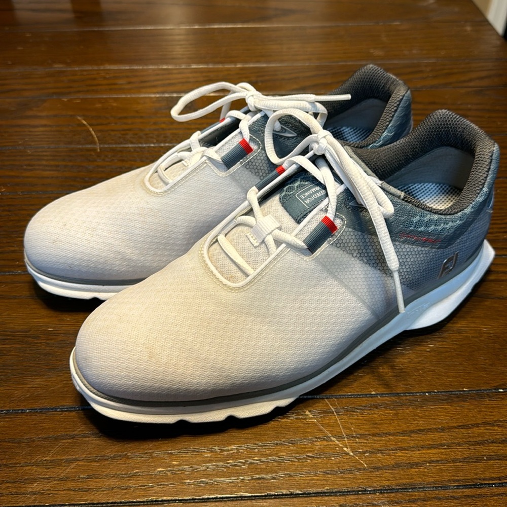 Gently used (one round of golf) FootJoy Pro SL golf shoes. Size 9W.